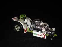 1/64 Claas Green Monster Pulling Tractor